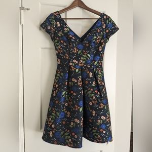 Stunning floral jacquard short A-line dress. Size 4.